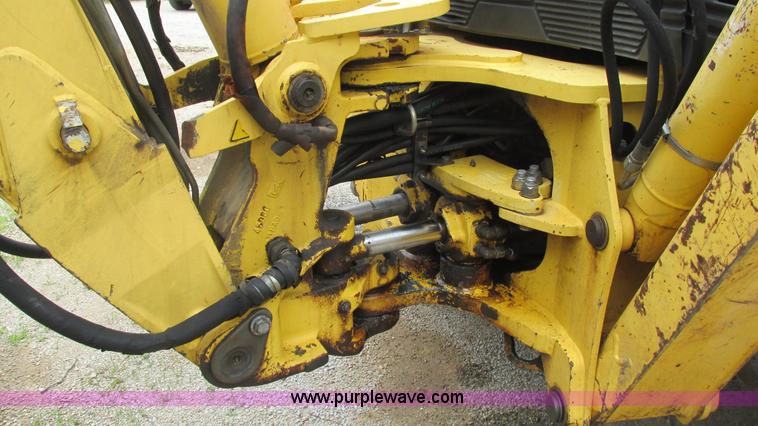 image for item I3054 2000 New Holland LB115 backhoe