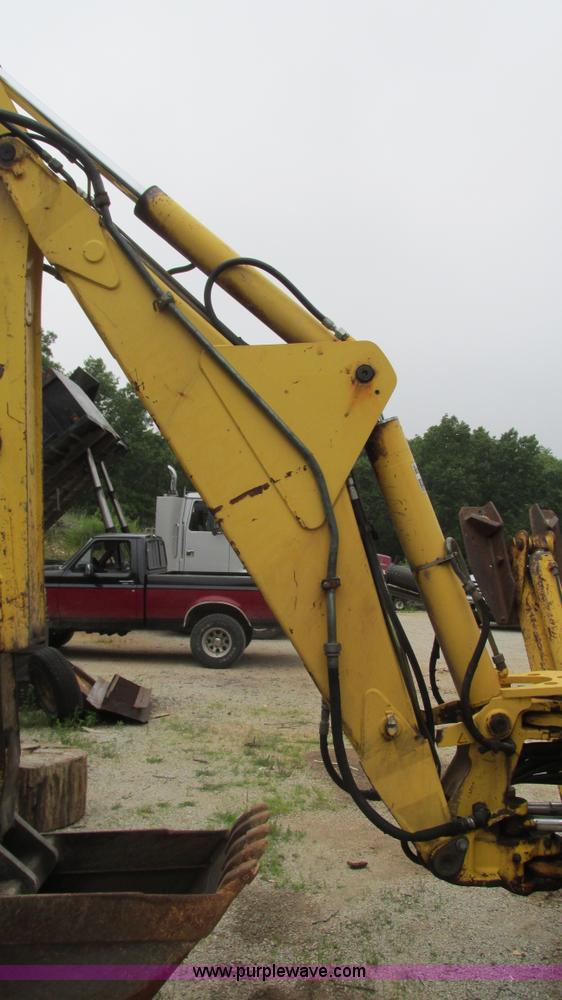 image for item I3054 2000 New Holland LB115 backhoe