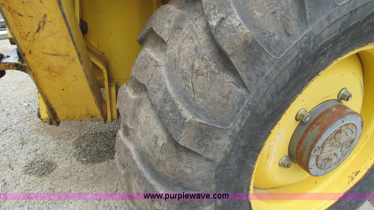 image for item I3054 2000 New Holland LB115 backhoe