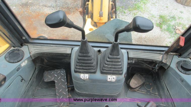 image for item I3054 2000 New Holland LB115 backhoe