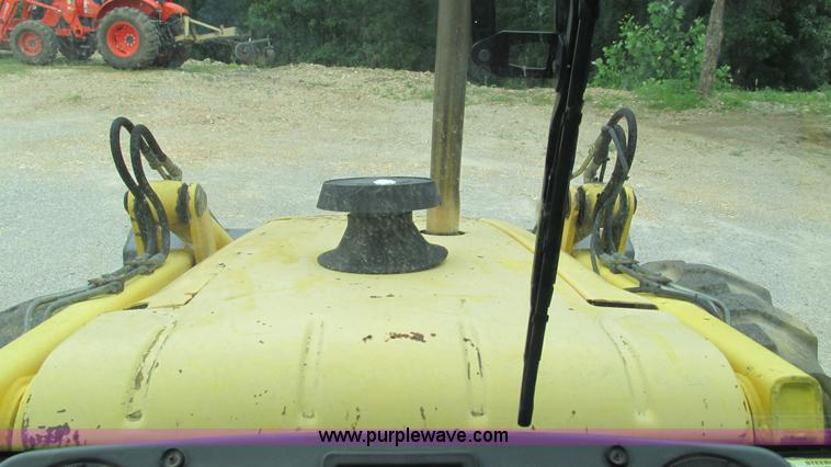 image for item I3054 2000 New Holland LB115 backhoe