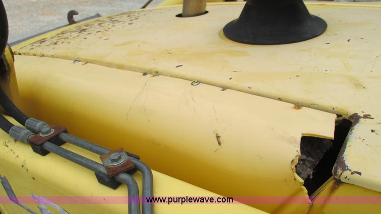 image for item I3054 2000 New Holland LB115 backhoe