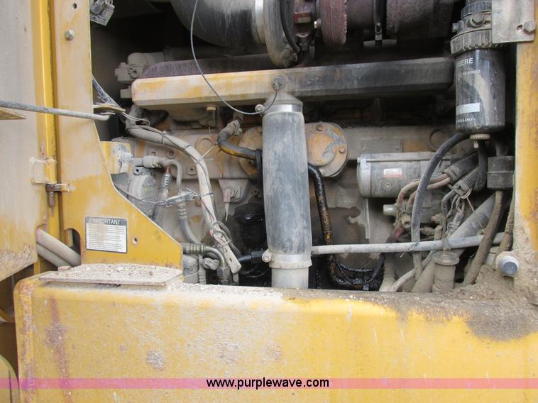 image for item K2147 2004 John Deere 770CH motor grader