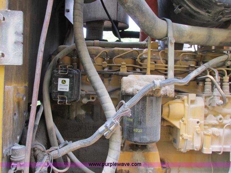 image for item K2147 2004 John Deere 770CH motor grader