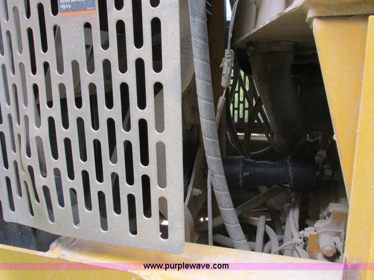 image for item K2147 2004 John Deere 770CH motor grader