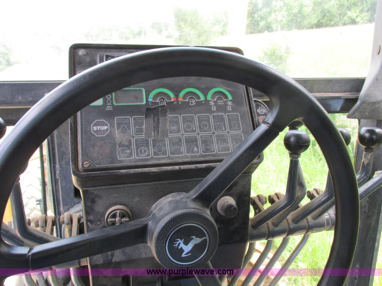 image for item K2147 2004 John Deere 770CH motor grader