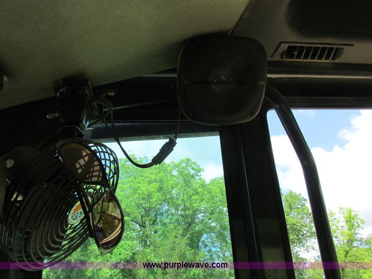 image for item K2147 2004 John Deere 770CH motor grader