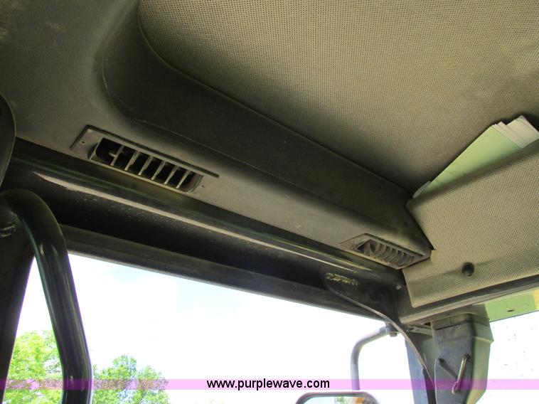 image for item K2147 2004 John Deere 770CH motor grader