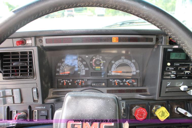 image for item K6931 1999 GMC C7500 dump truck