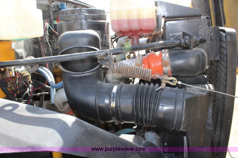 image for item K6931 1999 GMC C7500 dump truck