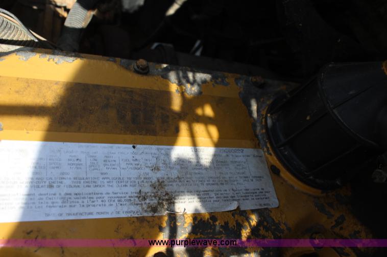 image for item K6931 1999 GMC C7500 dump truck