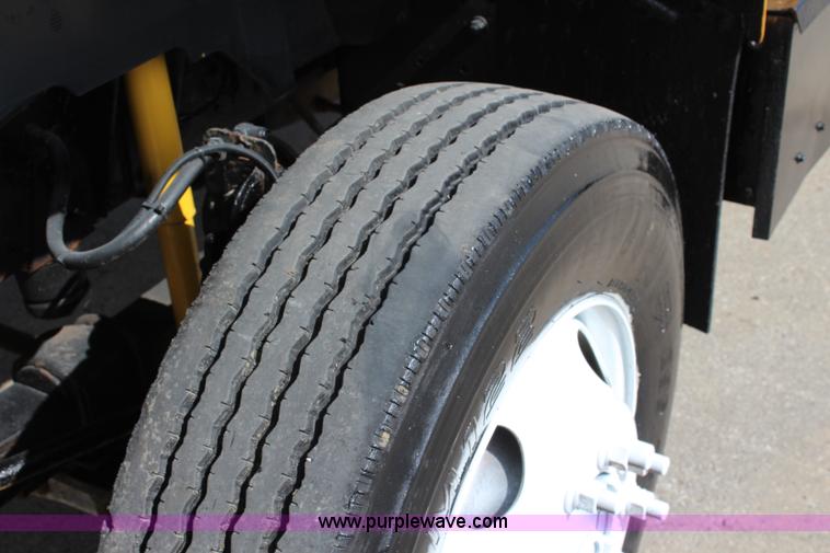 image for item K6931 1999 GMC C7500 dump truck