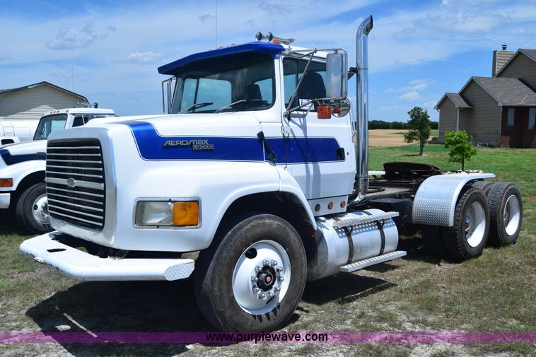 image for item K8612 1994 Ford LTA9000 AeroMax 106 semi truck