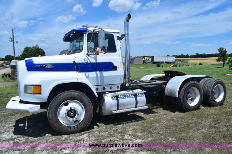 image for item K8612 1994 Ford LTA9000 AeroMax 106 semi truck