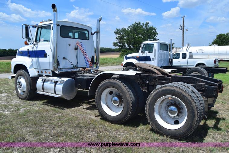 image for item K8612 1994 Ford LTA9000 AeroMax 106 semi truck