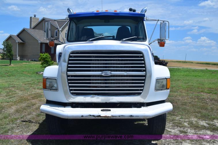 image for item K8612 1994 Ford LTA9000 AeroMax 106 semi truck