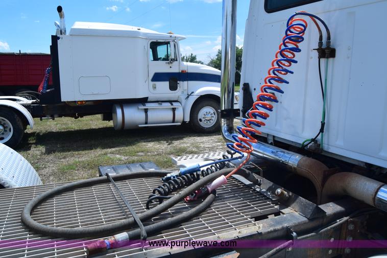 image for item K8612 1994 Ford LTA9000 AeroMax 106 semi truck