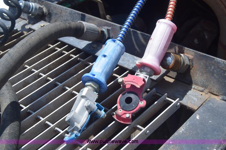 image for item K8612 1994 Ford LTA9000 AeroMax 106 semi truck