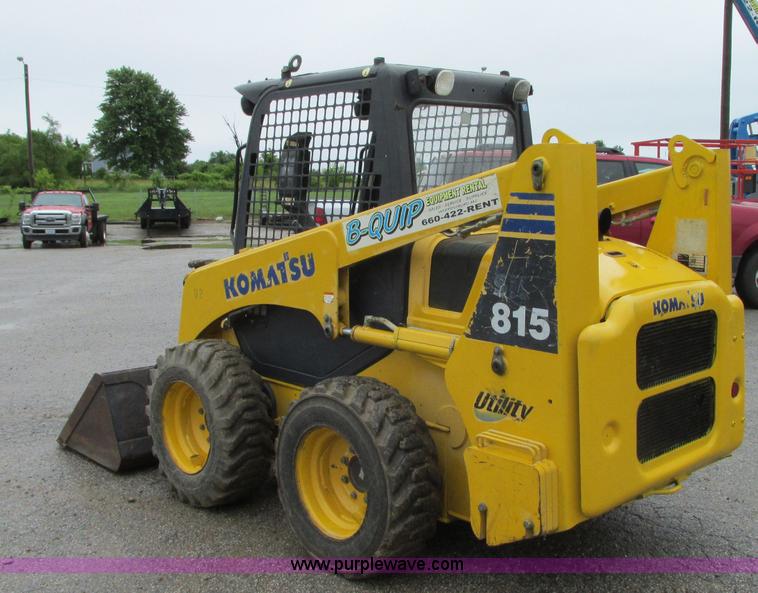 image for item R9316 2003 Komatsu SK815 skid steer