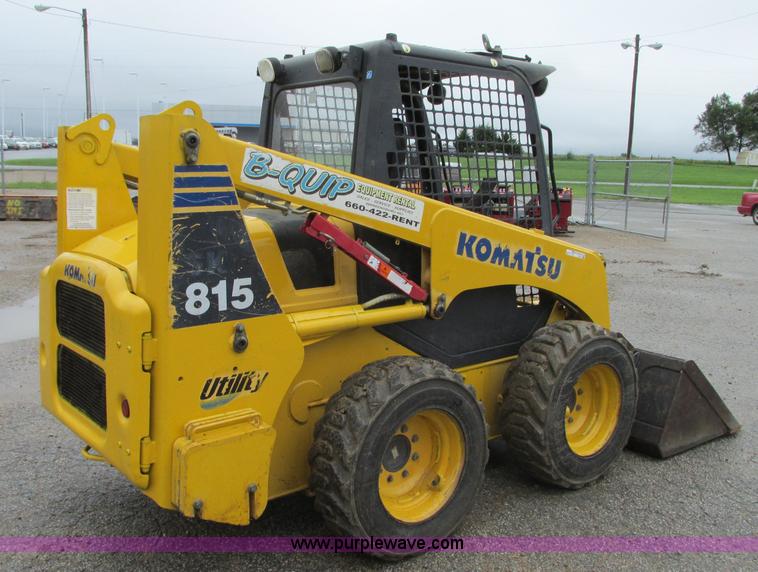 image for item R9316 2003 Komatsu SK815 skid steer