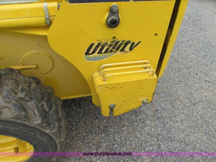 image for item R9316 2003 Komatsu SK815 skid steer