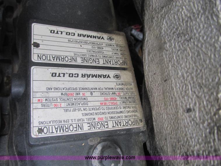 image for item R9316 2003 Komatsu SK815 skid steer