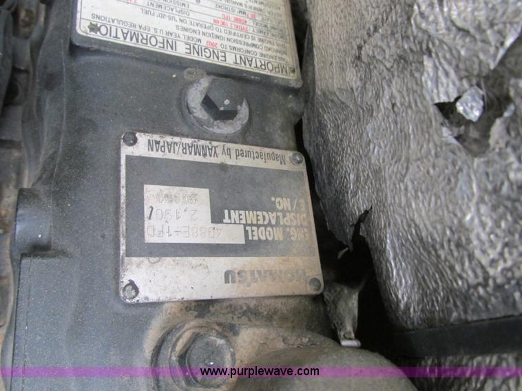 image for item R9316 2003 Komatsu SK815 skid steer