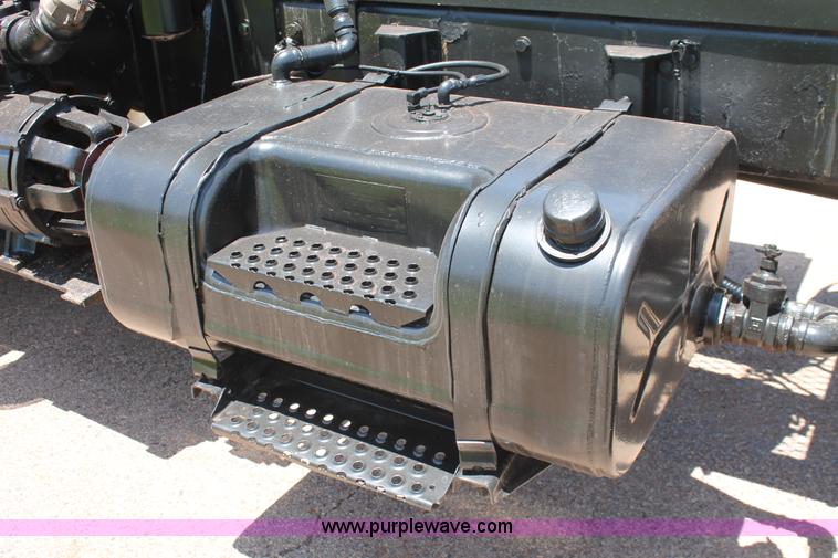 image for item H8204 2004 Kenworth T800 vacuum winch semi truck