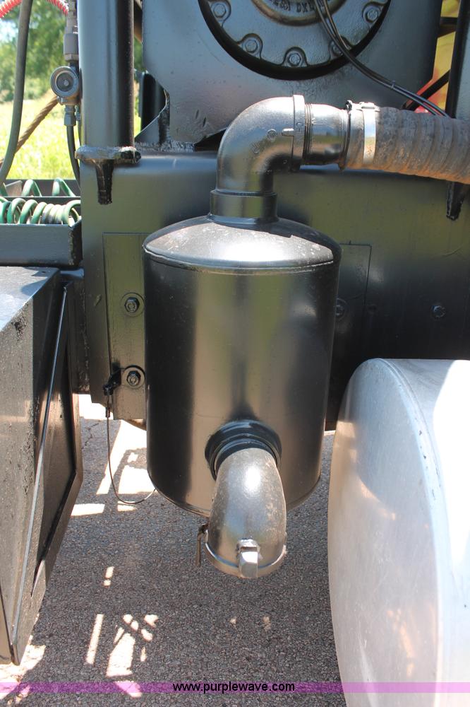 image for item H8204 2004 Kenworth T800 vacuum winch semi truck