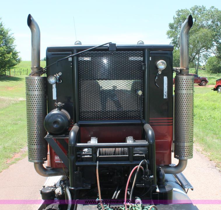 image for item H8204 2004 Kenworth T800 vacuum winch semi truck