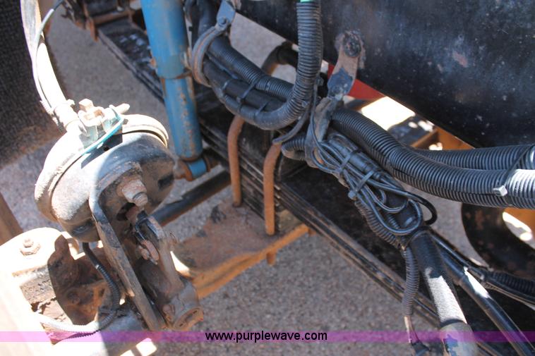 image for item H8204 2004 Kenworth T800 vacuum winch semi truck