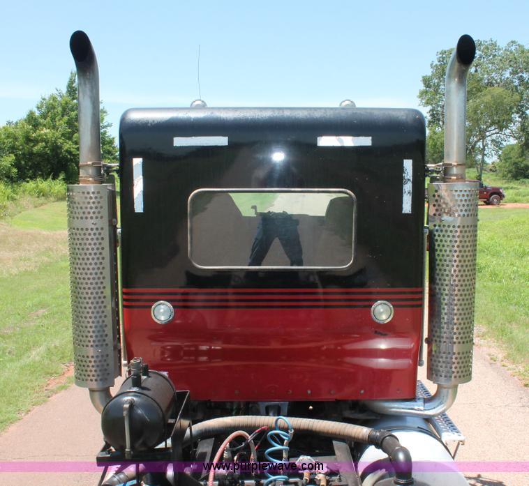 image for item H8205 2006 Kenworth T800 vacuum semi truck