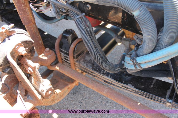 image for item H8205 2006 Kenworth T800 vacuum semi truck