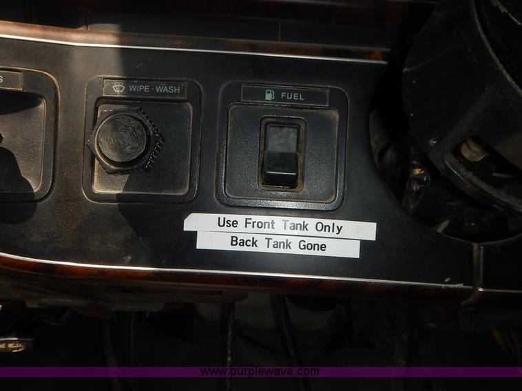 image for item J3860 1991 Ford F450 Super Duty XL flatbed dump truck