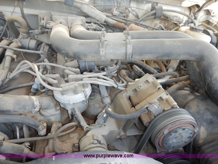 image for item J3860 1991 Ford F450 Super Duty XL flatbed dump truck