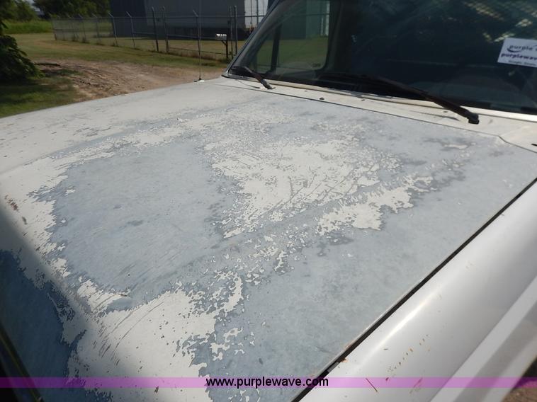 image for item J3860 1991 Ford F450 Super Duty XL flatbed dump truck