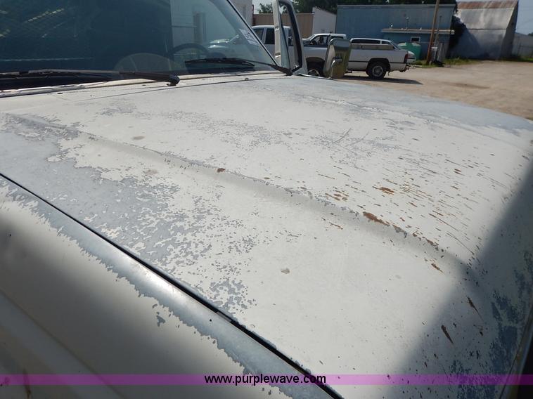 image for item J3860 1991 Ford F450 Super Duty XL flatbed dump truck