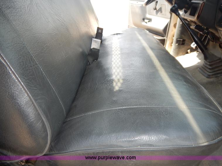 image for item J3860 1991 Ford F450 Super Duty XL flatbed dump truck