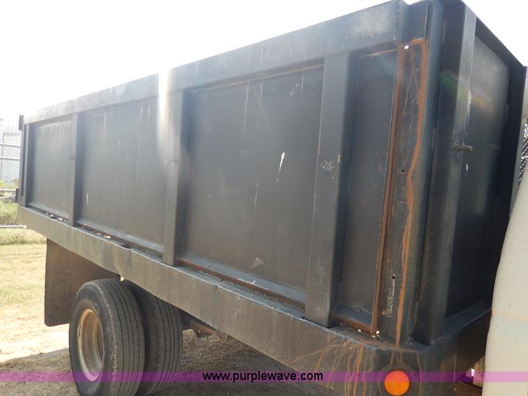 image for item J3860 1991 Ford F450 Super Duty XL flatbed dump truck