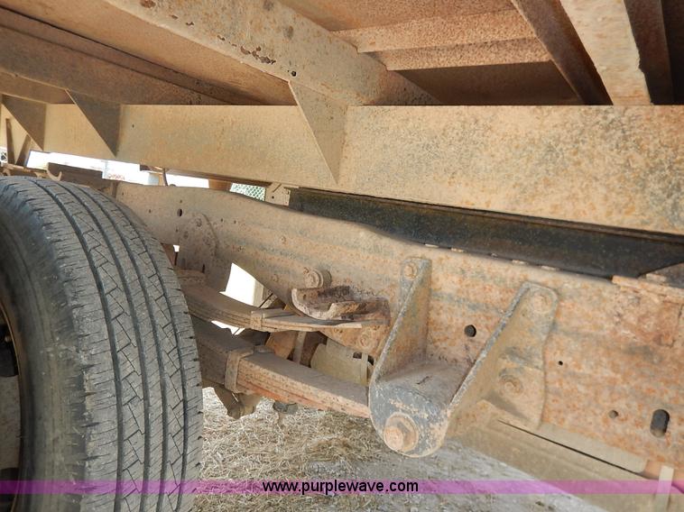 image for item J3860 1991 Ford F450 Super Duty XL flatbed dump truck