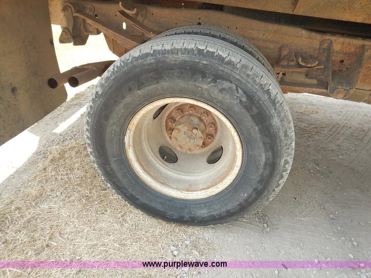 image for item J3860 1991 Ford F450 Super Duty XL flatbed dump truck