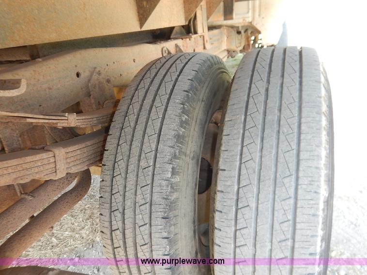 image for item J3860 1991 Ford F450 Super Duty XL flatbed dump truck