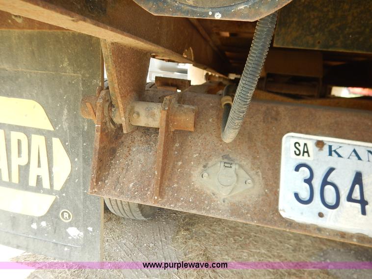 image for item J3860 1991 Ford F450 Super Duty XL flatbed dump truck