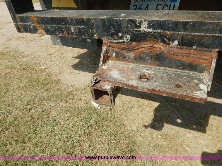 image for item J3860 1991 Ford F450 Super Duty XL flatbed dump truck