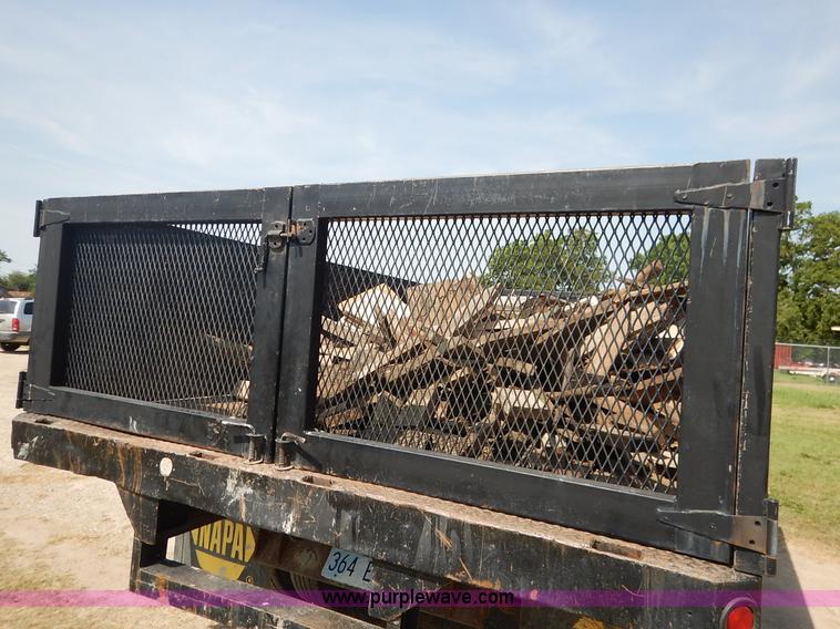 image for item J3860 1991 Ford F450 Super Duty XL flatbed dump truck