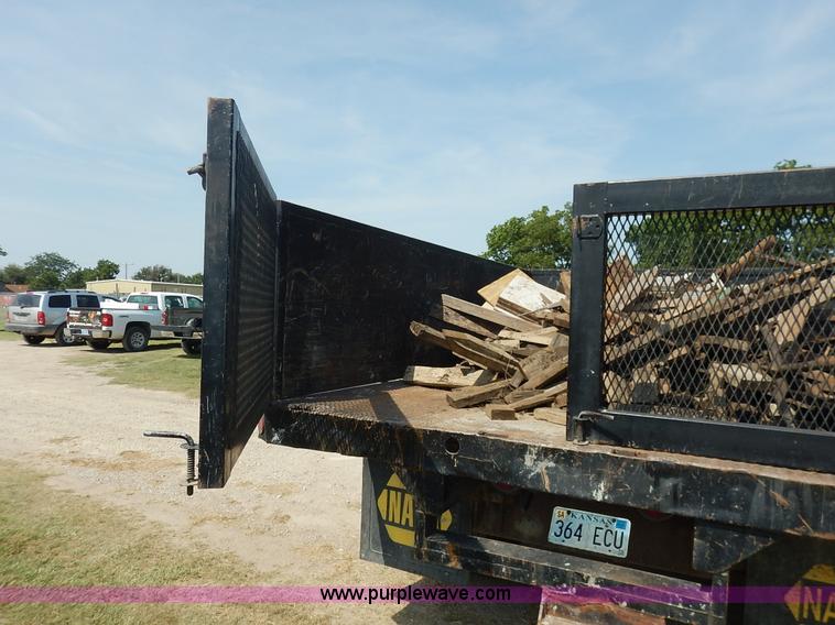 image for item J3860 1991 Ford F450 Super Duty XL flatbed dump truck
