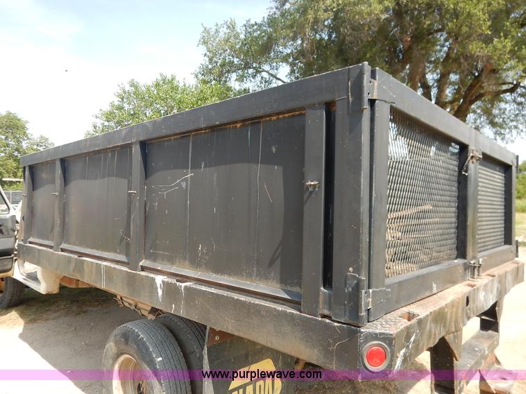 image for item J3860 1991 Ford F450 Super Duty XL flatbed dump truck