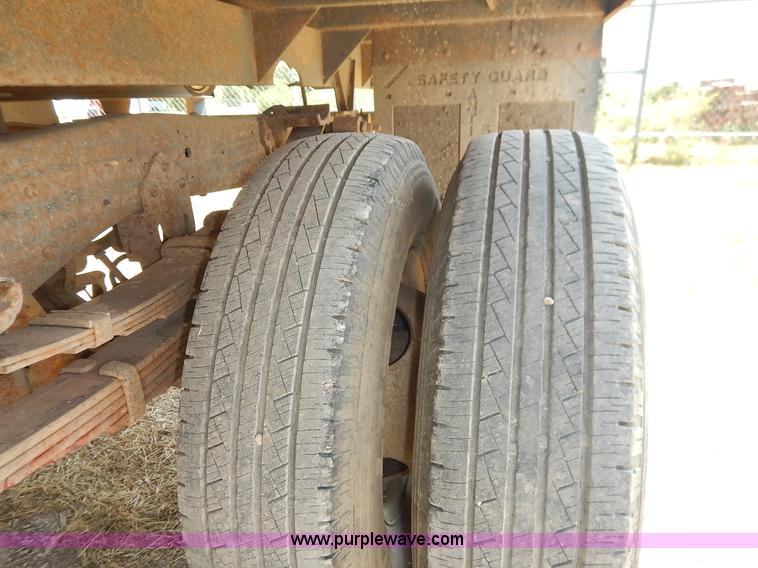 image for item J3860 1991 Ford F450 Super Duty XL flatbed dump truck