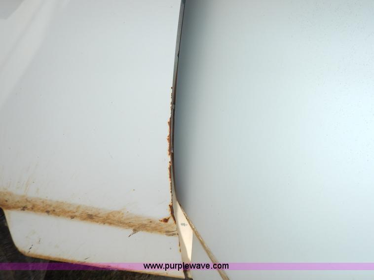 image for item J3860 1991 Ford F450 Super Duty XL flatbed dump truck