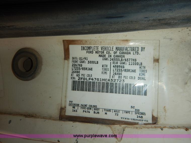 image for item J3860 1991 Ford F450 Super Duty XL flatbed dump truck